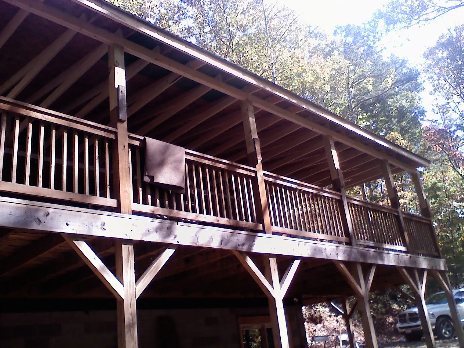 Timber framing under a new elevated porch and deck — Roof Leak Repair in Walden by Roofing Brothers